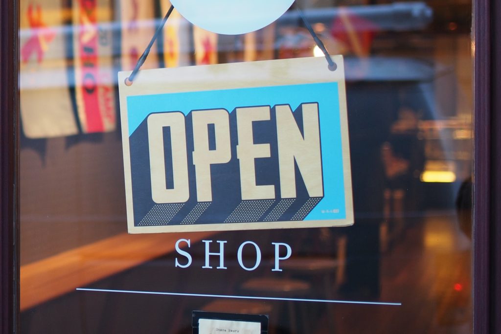 Shop sign saying "open".